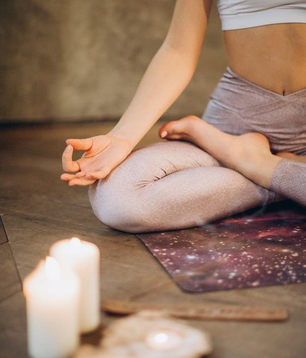 Woman in a calm yoga pose, embodying body harmony and peace.